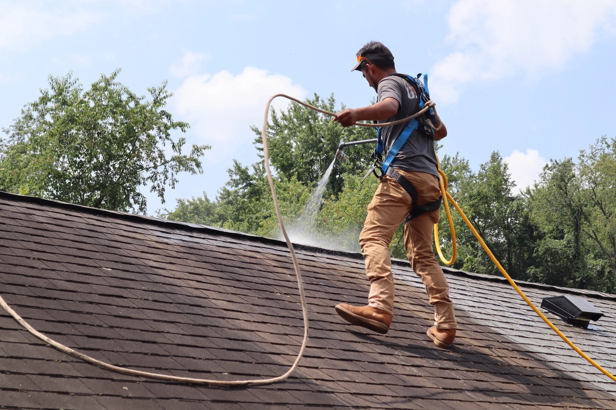 secured roofing worker roof rejuvenation